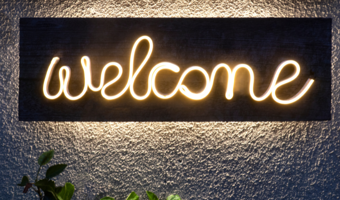 welcome sign in neon